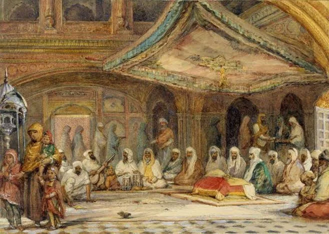 Musicians performing raag kirtan in a historic gurdwara diwan